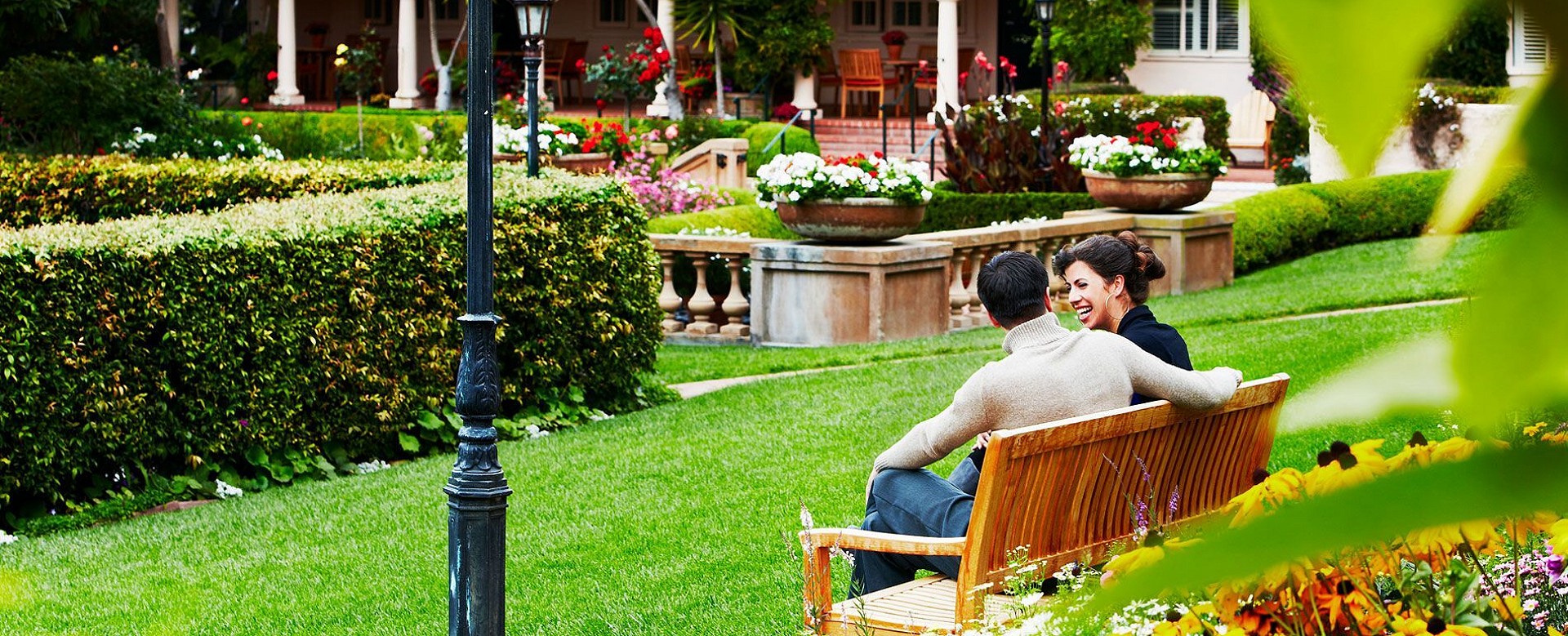 La Playa Carmel - couple seated on bench
