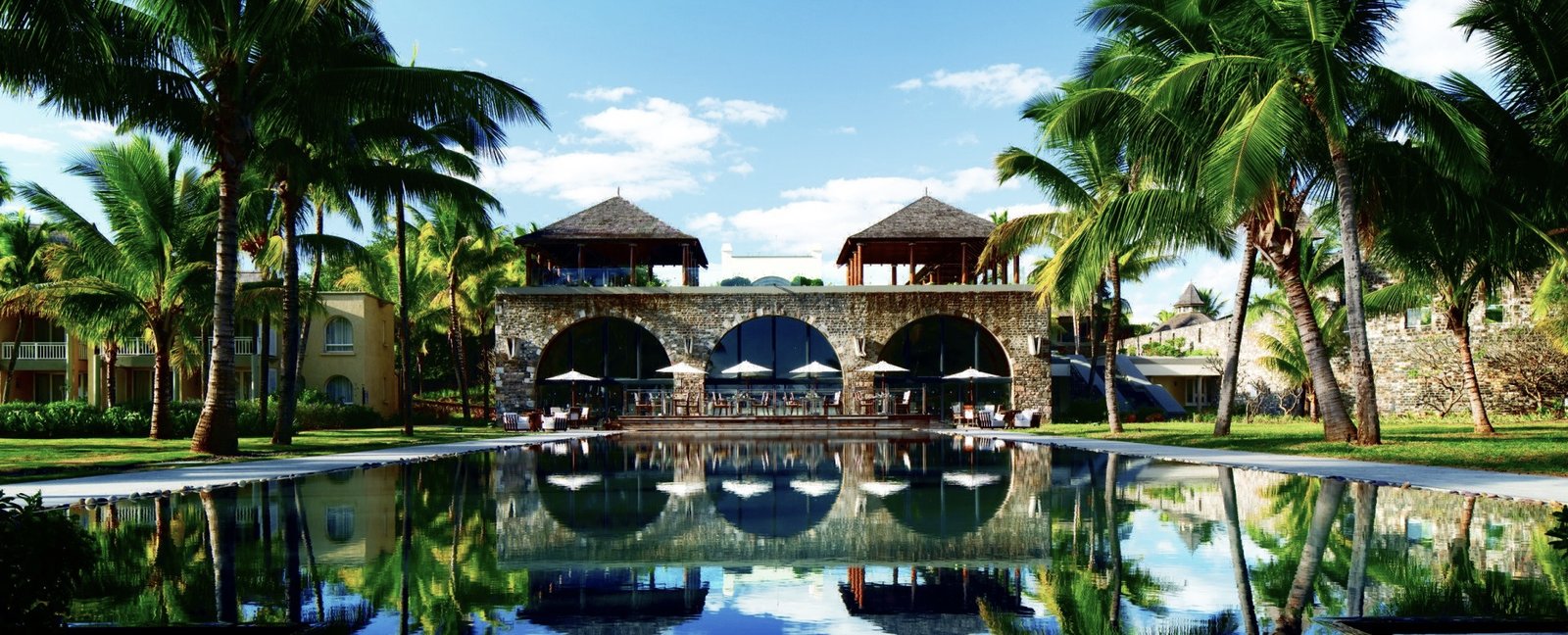 Outrigger Mauritius Resort-Exterior Pool and Palm Trees